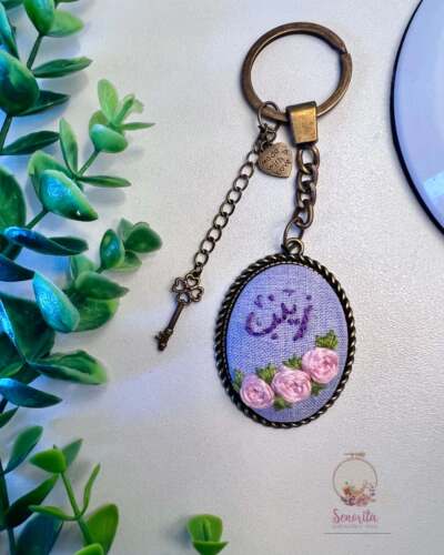 ميدالية نسائية بنفسجي